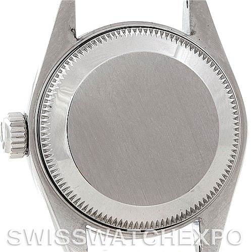 The image shows the back case and crown of a Rolex Date 79160 Women's Stainless Steel Blue Dial 79160 Women's Stainless Steel Blue Dial model watch.