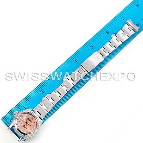 The image shows a Rolex Date 79160 Women's Stainless Steel Pink Dial 79160 Women's Stainless Steel Pink Dial model watch laid flat next to a ruler, displaying the face, bracelet, and clasp from a top-down angle.