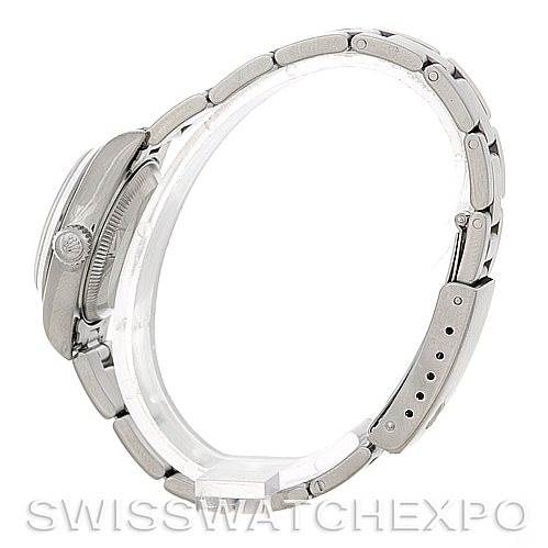 The image shows a side view of a Rolex Date 79160 Women's Stainless Steel Pink Dial 79160 Women's Stainless Steel Pink Dial model watch, focusing on the case, crown, and bracelet.