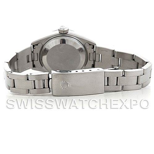 This image shows the back side of a Rolex Date 79240 Women's Stainless Steel Silver Dial 79240 Women's Stainless Steel Silver Dial model watch, highlighting its closed bracelet and clasp.