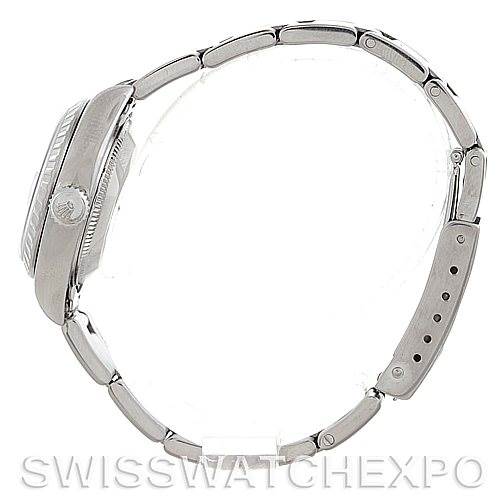 This image shows a side view of a Rolex Date 79240 Women's Stainless Steel Silver Dial 79240 Women's Stainless Steel Silver Dial model watch, highlighting the case, crown, and bracelet.