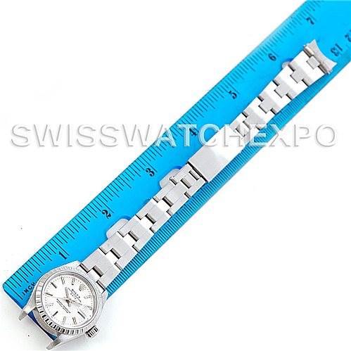 The image shows a Rolex Date 79240 Women's Stainless Steel Silver Dial 79240 Women's Stainless Steel Silver Dial model watch laid next to a ruler, displaying the watch face and bracelet.