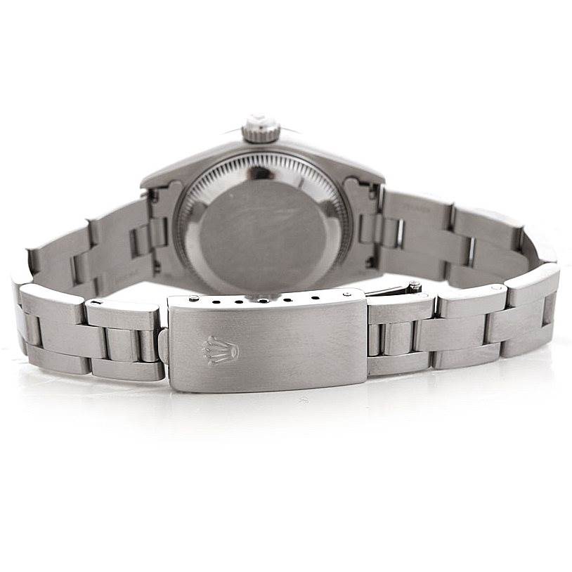 This image shows the back of a Rolex Date 69160 Women's Stainless Steel White Dial 69160 Women's Stainless Steel White Dial model watch focusing on its clasp and bracelet.