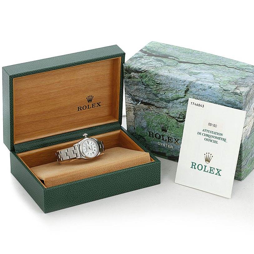 The image shows a Rolex Date 69160 Women's Stainless Steel White Dial 69160 Women's Stainless Steel White Dial model watch in an open display box with an accessory box and certificate.