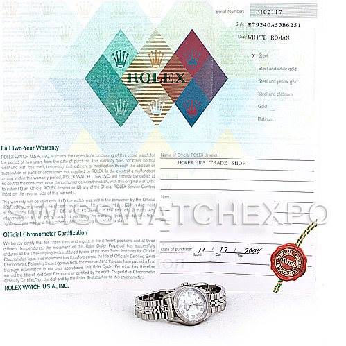 The image shows a Rolex Date 79240 Women's Stainless Steel White Dial 79240 Women's Stainless Steel White Dial model watch with a bracelet, displayed alongside its warranty and certification documents.