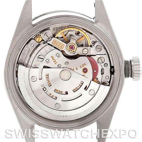 This image shows the back of a Rolex Date 79240 Women's Stainless Steel White Dial 79240 Women's Stainless Steel White Dial model watch, revealing its automatic movement and internal mechanics.