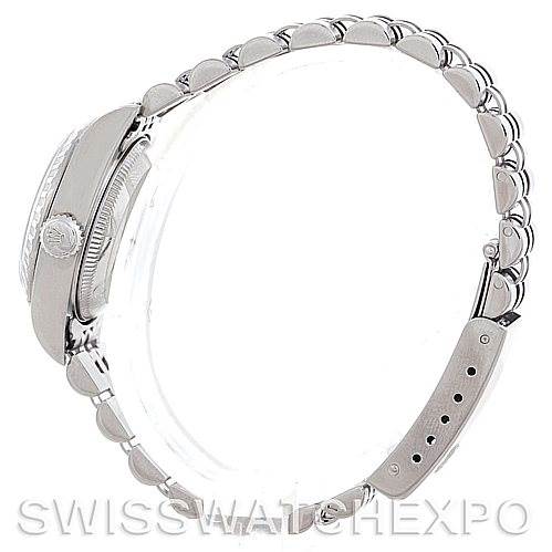 This image shows a side view of the Rolex Date 79240 Women's Stainless Steel White Dial 79240 Women's Stainless Steel White Dial model watch, highlighting the case, crown, and bracelet.