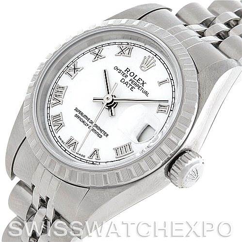 This image shows a Rolex Date 79240 Women's Stainless Steel White Dial 79240 Women's Stainless Steel White Dial model watch at an angled top view, displaying the dial, bezel, crown, and part of the bracelet.