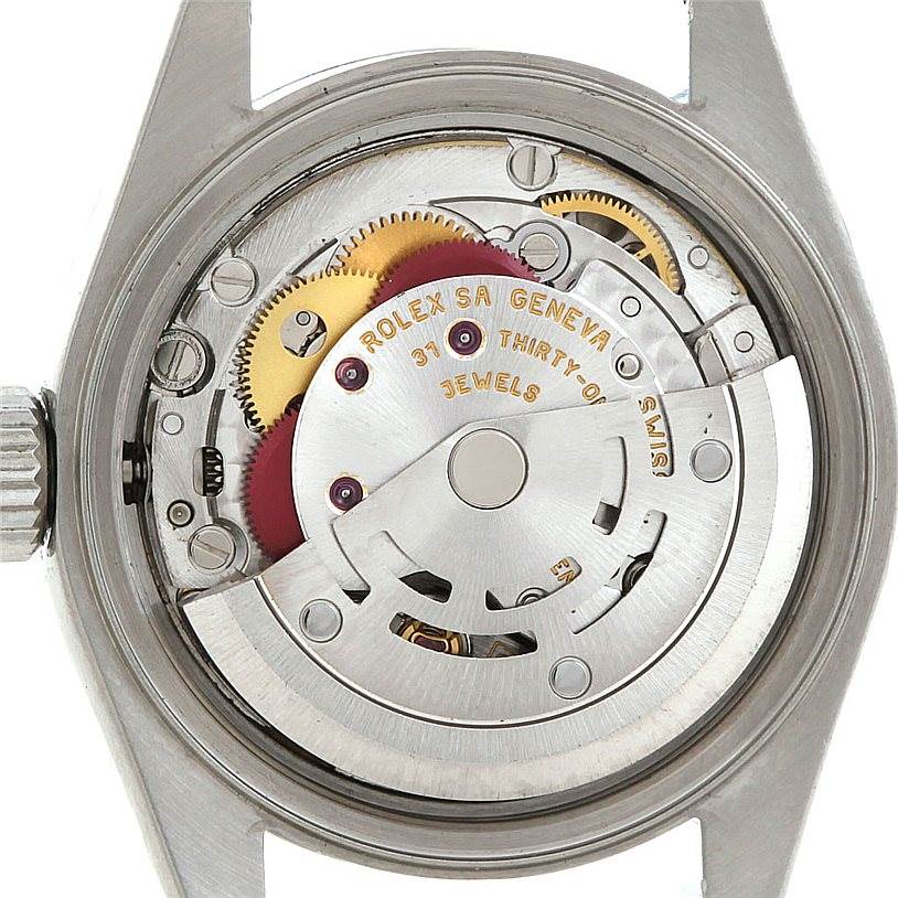 This image shows the internal mechanism and parts of a Rolex Date 79190 Women's Stainless Steel Blue Dial 79190 Women's Stainless Steel Blue Dial model watch from a back angle.