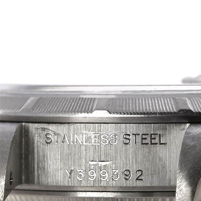 This image shows a close-up, side view of the case and serial number of the Rolex Date 79190 Women's Stainless Steel Blue Dial 79190 Women's Stainless Steel Blue Dial model watch.