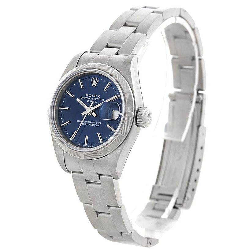The image shows a Rolex Date 79190 Women's Stainless Steel Blue Dial 79190 Women's Stainless Steel Blue Dial model watch at a three-quarter angle displaying the face, crown, bezel, and bracelet.
