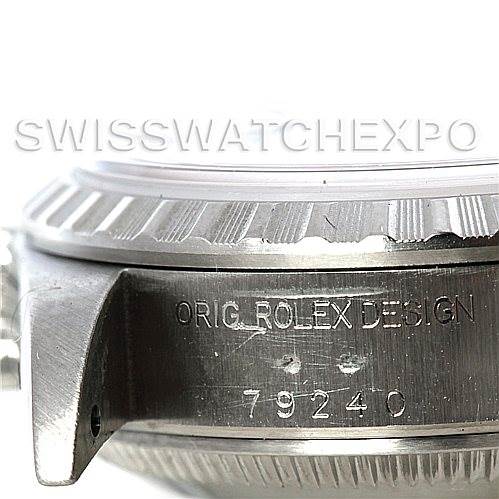 The image shows a close-up view of the side engraving, bezel, and case of a Rolex Date 79240 Women's Stainless Steel Pink Dial 79240 Women's Stainless Steel Pink Dial model watch.