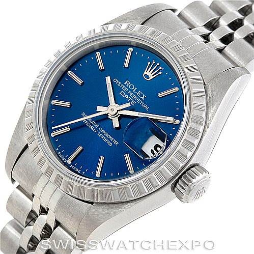 The image shows a Rolex Date 69240 Women's Stainless Steel Blue Dial 69240 Women's Stainless Steel Blue Dial model watch from a front angle, highlighting its blue dial, fluted bezel, and part of its jubilee bracelet.