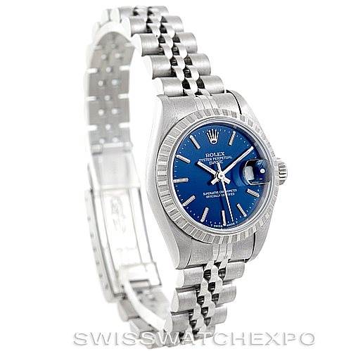 The image shows a side angle of a Rolex Date 69240 Women's Stainless Steel Blue Dial 69240 Women's Stainless Steel Blue Dial model watch, featuring its blue dial, bracelet, and clasp.