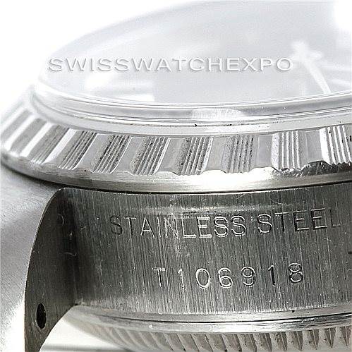 This image shows a close-up of the case side and bezel of a stainless steel Rolex Date 69240 Women's Stainless Steel Blue Dial 69240 Women's Stainless Steel Blue Dial model watch.