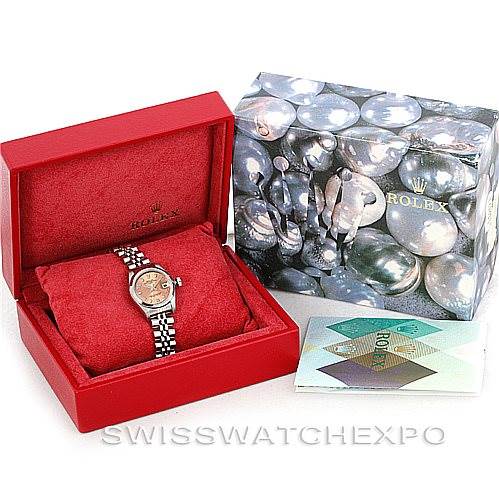 The image shows a Rolex Date 79160 Women's Stainless Steel Pink Dial 79160 Women's Stainless Steel Pink Dial watch at an angle that displays the face and bracelet, along with its red box, warranty card, and an outer box.