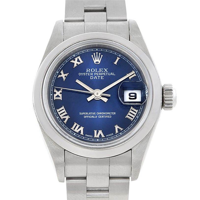 The image shows a front view of a Rolex Oyster Perpetual Date watch with a blue dial and date window.