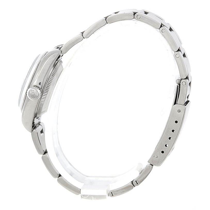 This side view showcases the case, crown, and bracelet of a Rolex Date 79240 Women's Stainless Steel Blue Dial 79240 Women's Stainless Steel Blue Dial model watch.