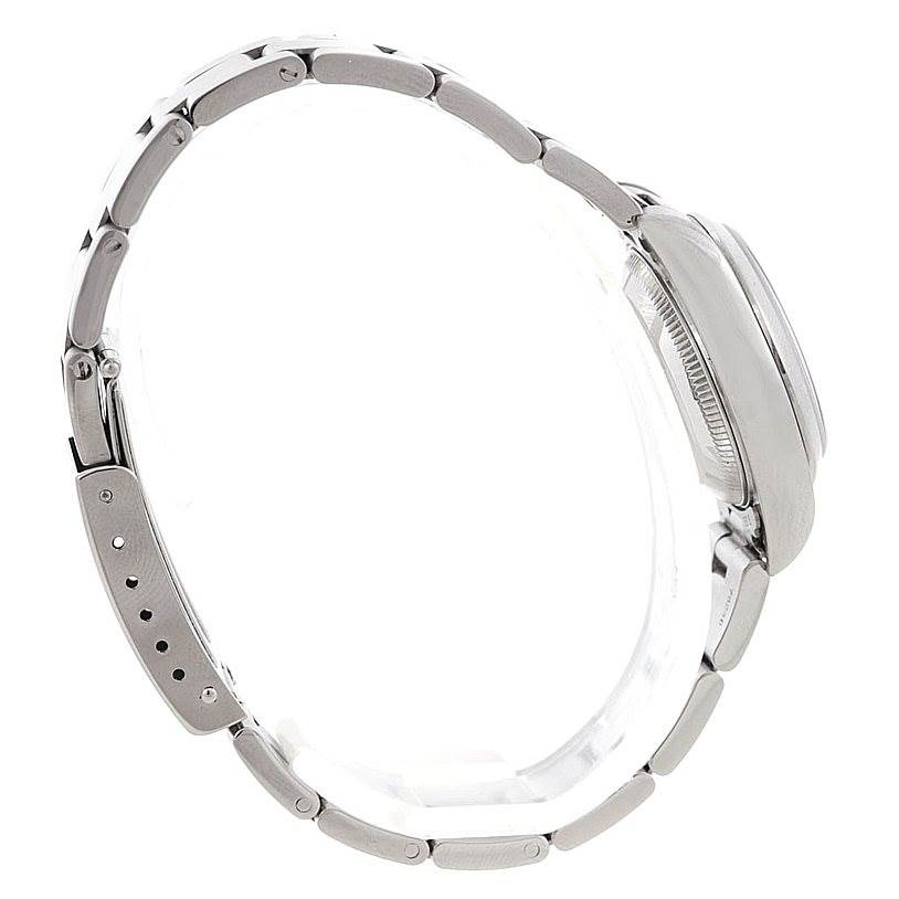 The Rolex Date 79240 Women's Stainless Steel Blue Dial 79240 Women's Stainless Steel Blue Dial model watch is shown from a side angle, highlighting its case, bracelet, and clasp.