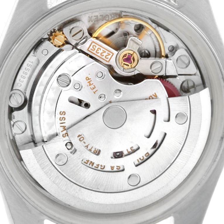 The image shows the movement of a Rolex Date 79160 Women's Stainless Steel Beige Dial 79160 Women's Stainless Steel Beige Dial model watch viewed from the back.