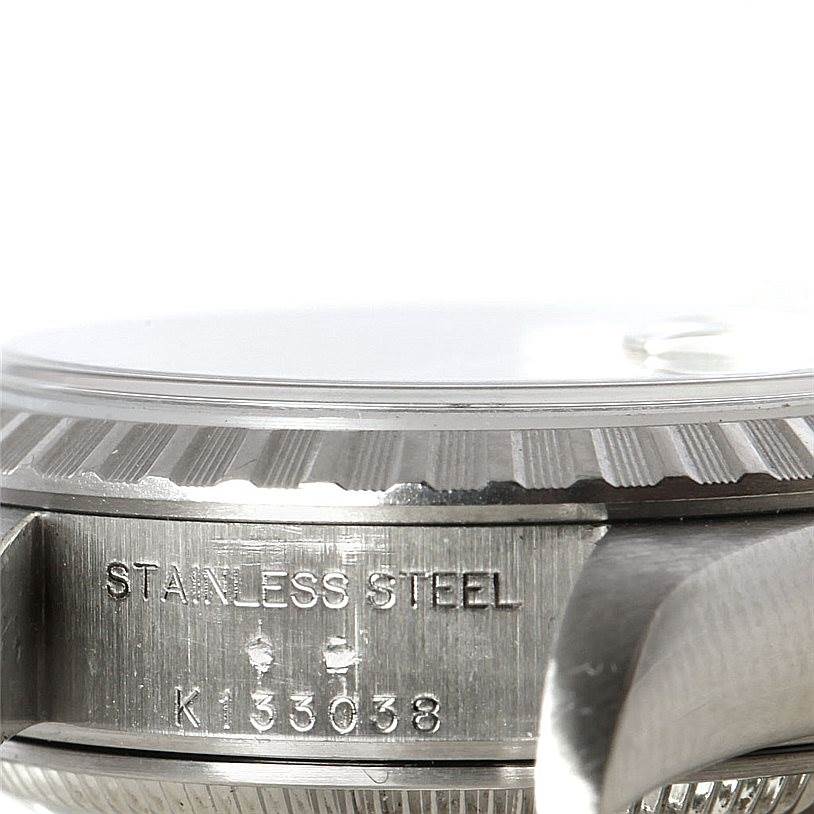 This image shows a close-up side view of the serial number and stainless steel casing of the Rolex Date 79240 Women's Stainless Steel Silver Dial 79240 Women's Stainless Steel Silver Dial watch.