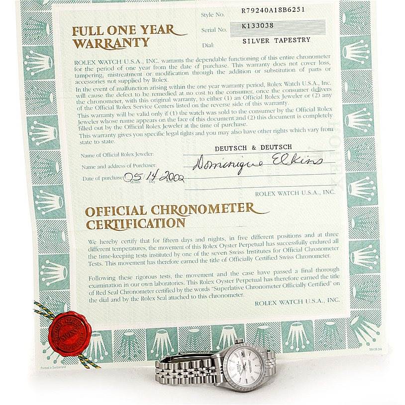 The image shows a full view of a Rolex Date 79240 Women's Stainless Steel Silver Dial 79240 Women's Stainless Steel Silver Dial model watch and its official chronometer certification documents.