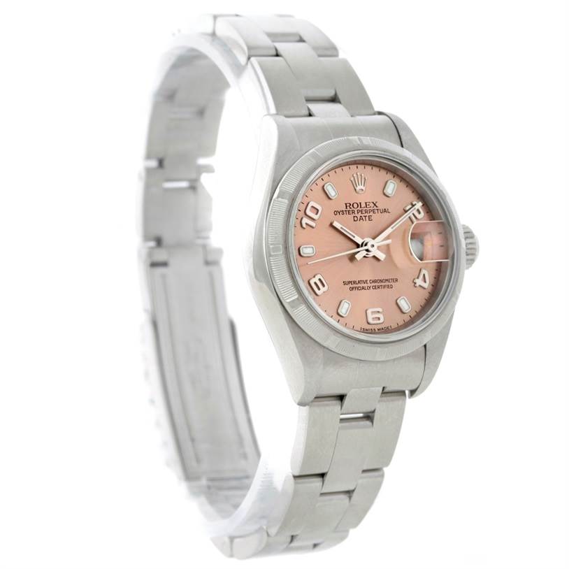 The image shows a side angle of the Rolex Date 79190 Women's Stainless Steel Pink Dial 79190 Women's Stainless Steel Pink Dial watch, highlighting its pink dial, bezel, case, and bracelet.