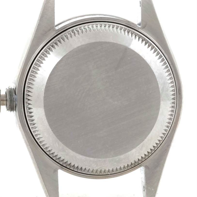 This image shows the back and case of a Rolex Date 79240 Women's Stainless Steel White Dial 79240 Women's Stainless Steel White Dial model watch, viewed head-on.