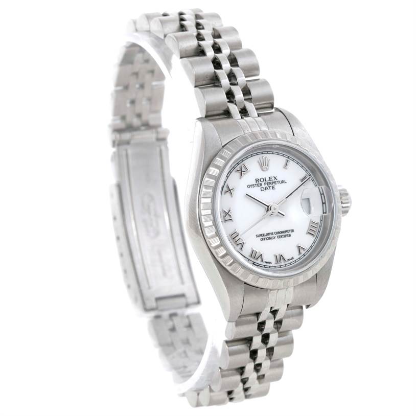 This image shows a Rolex Date 79240 Women's Stainless Steel White Dial 79240 Women's Stainless Steel White Dial model watch from an angle that highlights the face, bezel, and part of the bracelet.