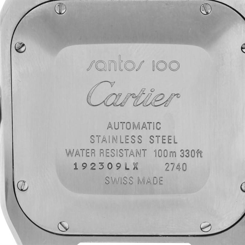 The image shows the case back of a Santos model by Cartier, showcasing engravings and screws at the corners.
