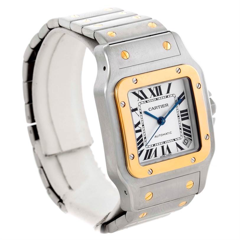 The image shows a Santos model watch by Cartier at an angle displaying the watch face, bezel, and bracelet.