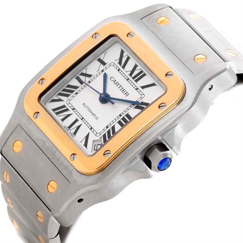 The image shows a close-up angle of a Cartier Santos W20099C4 Men
s Stainless Steel Silver Dial W20099C4 Men
s Stainless Steel Silver Dial watch, highlighting its face, bezel, crown, and part of the bracelet.