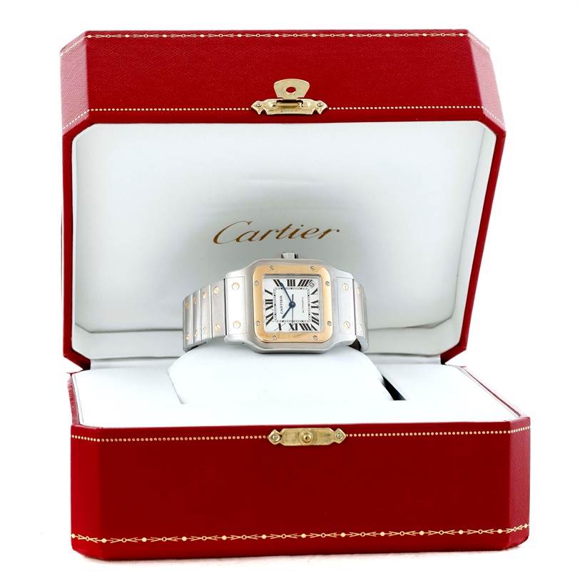 The image shows a Cartier Santos W20099C4 Men
s Stainless Steel Silver Dial W20099C4 Men
s Stainless Steel Silver Dial watch positioned front and center in an open Cartier box.