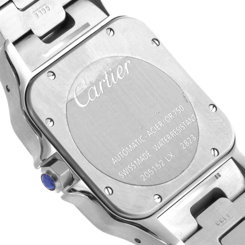 The image shows the back case and part of the bracelet of a Santos model by Cartier.