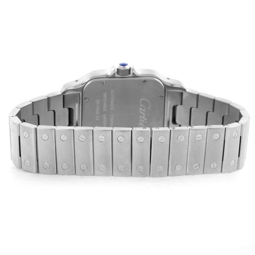 The image shows the back view of the Santos model by Cartier, highlighting its bracelet and case back.