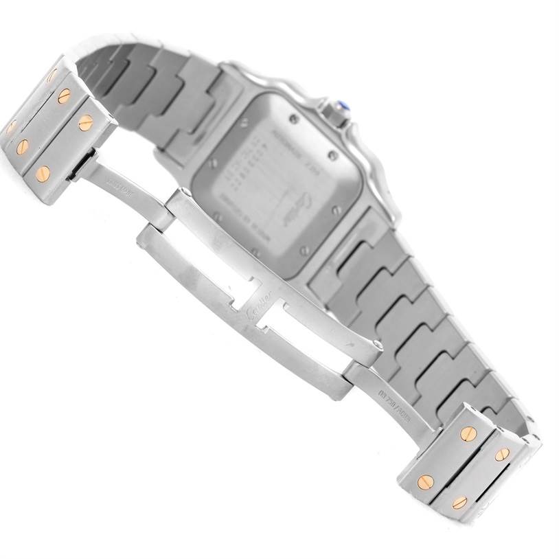 The image shows the back case, bracelet, and clasp of a Santos watch by Cartier from a rear angle.