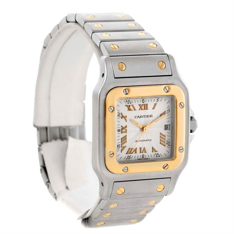 The image shows a Cartier Santos W20058C4 Men's Stainless Steel Silver Dial W20058C4 Men's Stainless Steel Silver Dial watch from a slight left-side angle, highlighting its gold bezel, dial, and part of the metal bracelet.