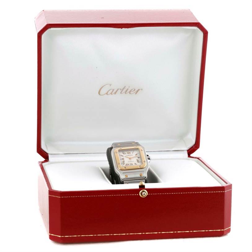 The Cartier Santos W20058C4 Men's Stainless Steel Silver Dial W20058C4 Men's Stainless Steel Silver Dial watch is shown in its open red case, with the face and part of the strap visible from the front angle.