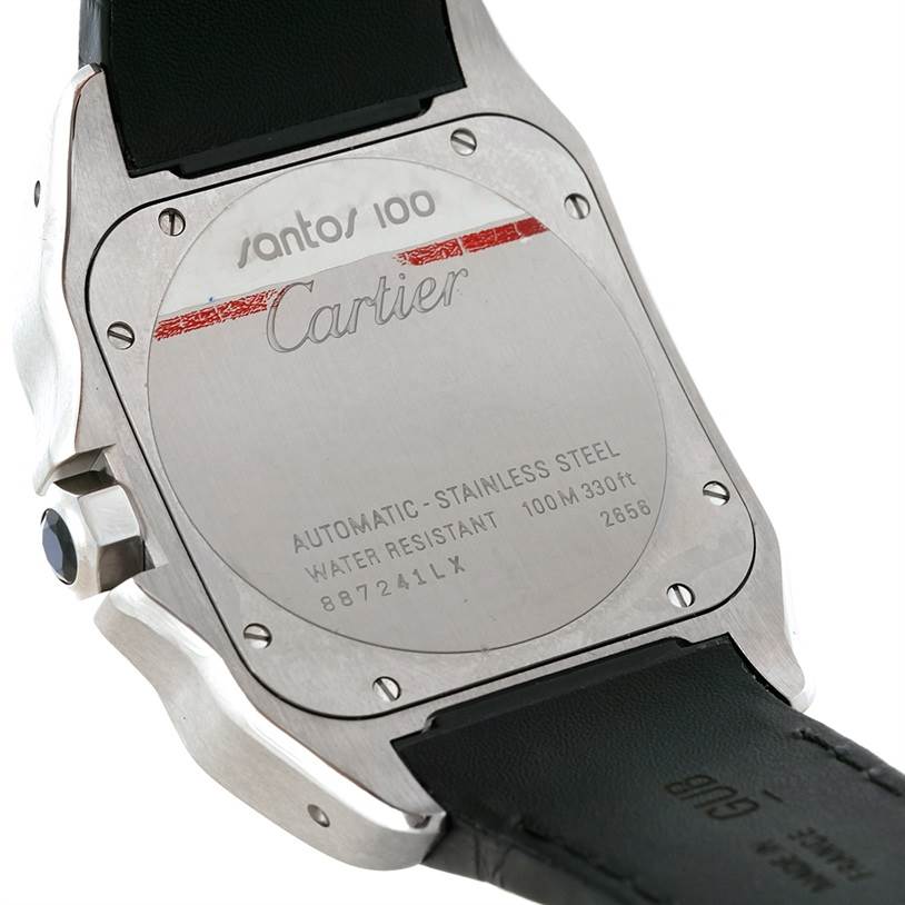 The image shows the case back of a Cartier Santos W20073X8 Men's Stainless Steel Silver Dial W20073X8 Men's Stainless Steel Silver Dial 100 watch, highlighting the stainless steel back and part of the leather strap.