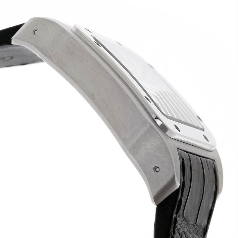 The image shows a side view of the case, bezel, and strap of a Cartier Santos W20073X8 Men's Stainless Steel Silver Dial W20073X8 Men's Stainless Steel Silver Dial watch.