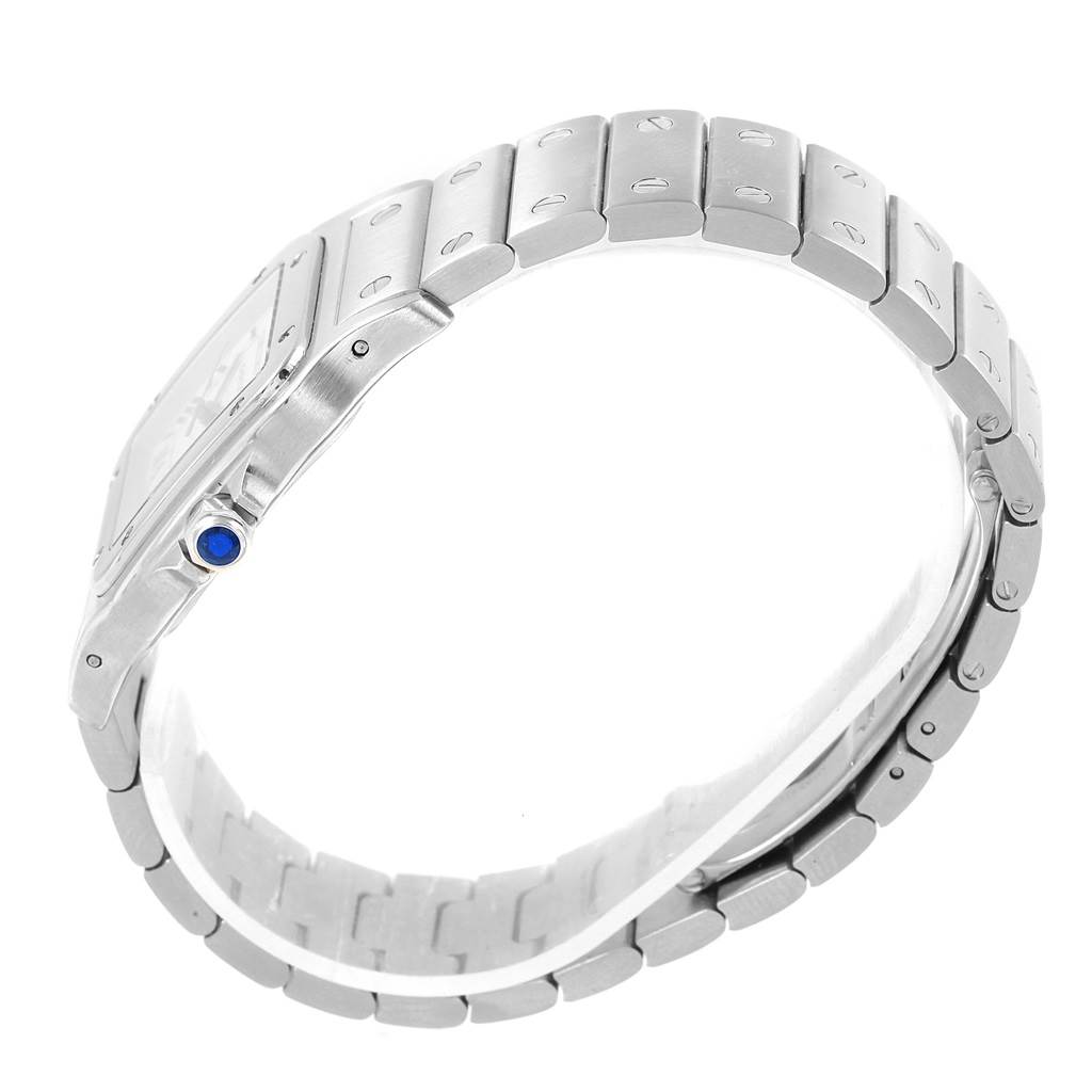 This image shows a side profile of the Cartier Santos W20060D6 Men
s Stainless Steel Silver Dial W20060D6 Men
s Stainless Steel Silver Dial watch, highlighting the metal bracelet and the blue crown.