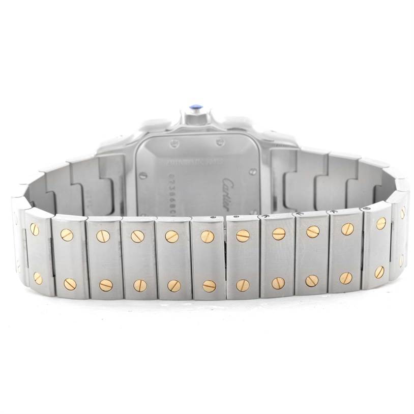 This image shows the back of the bracelet and case of a Santos model by Cartier.