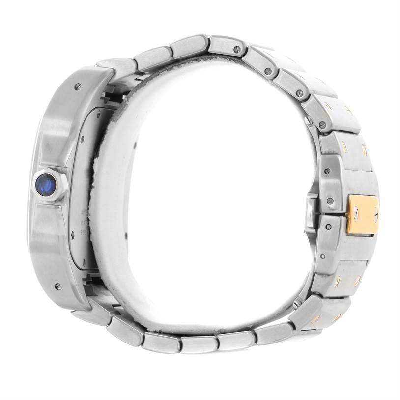 This image shows the side view of the Cartier Santos W200728G Men's Stainless Steel Silver Dial W200728G Men's Stainless Steel Silver Dial watch, highlighting its bracelet and crown with a blue gemstone.