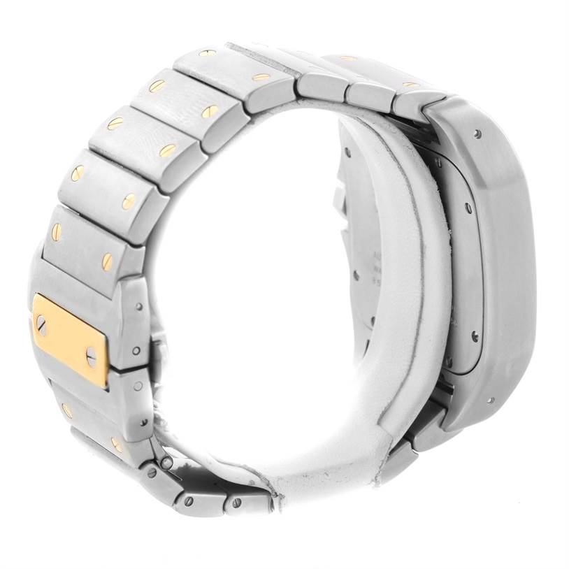 The image shows a side view of a Santos model by Cartier, displaying the metal bracelet and partial side of the watch case.