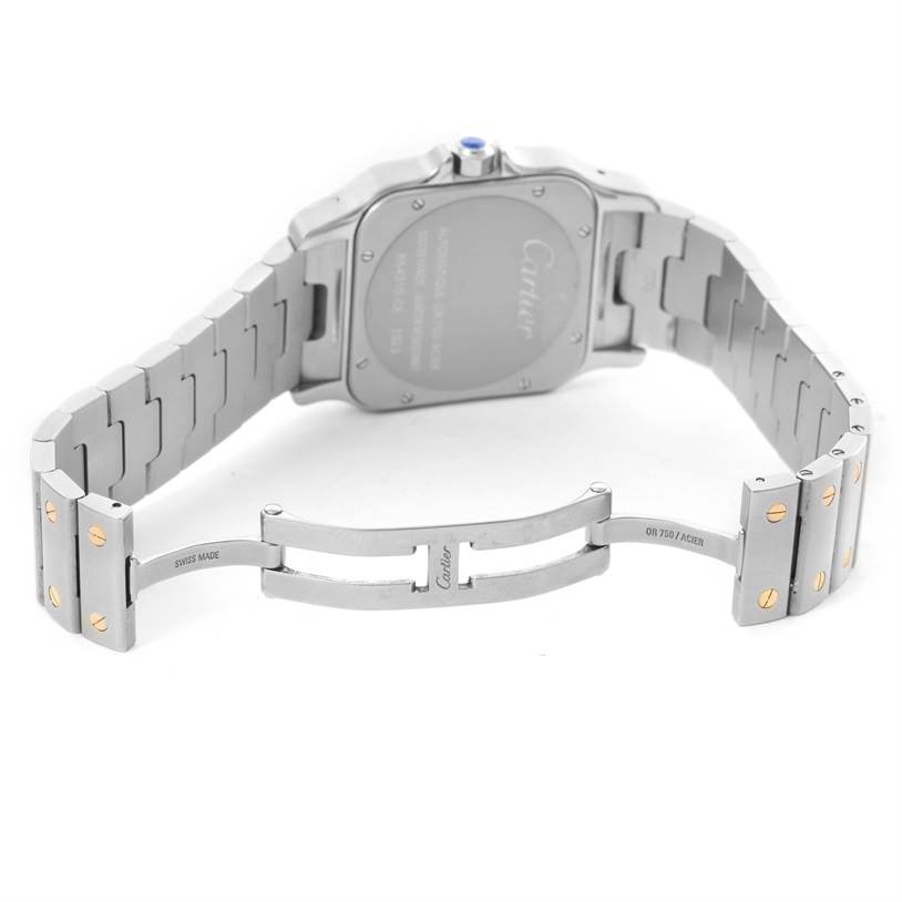 The image shows the back view and clasp mechanisms of a partially opened Cartier Santos W20099C4 Men's Stainless Steel Silver Dial W20099C4 Men's Stainless Steel Silver Dial watch.