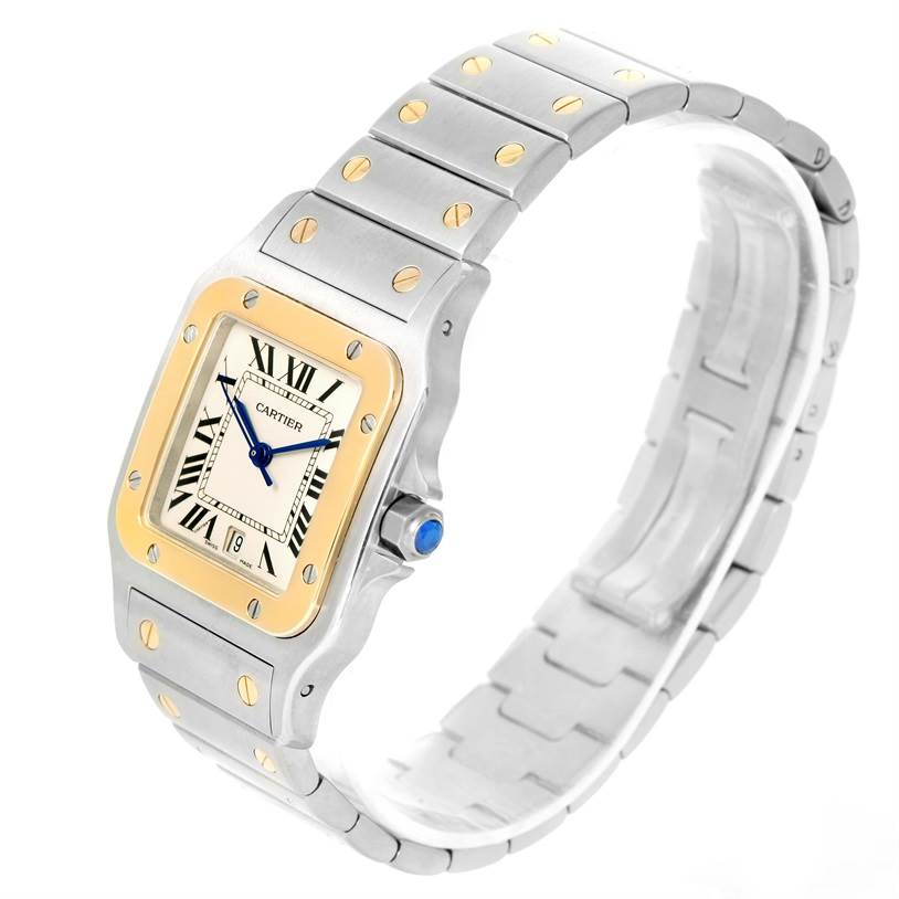 The Cartier Santos W20011C4 Men
s Stainless Steel Silver Dial W20011C4 Men
s Stainless Steel Silver Dial watch is shown at a slight angle, highlighting the face, bezel, crown, and metal bracelet.