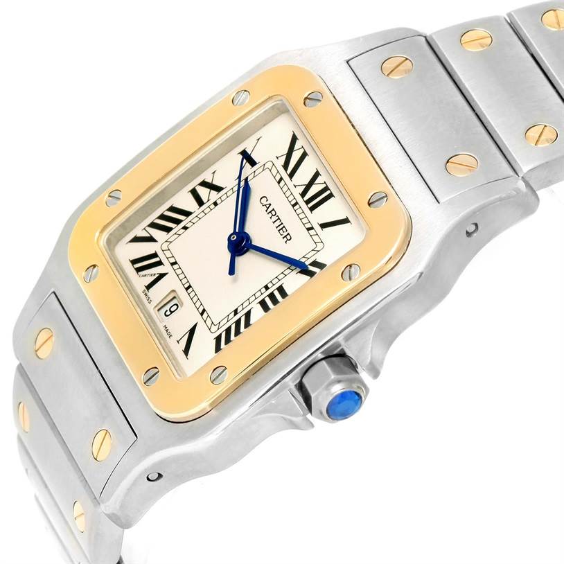 The image shows an angled view of a Santos model by Cartier, featuring the face, bezel, and part of the bracelet.