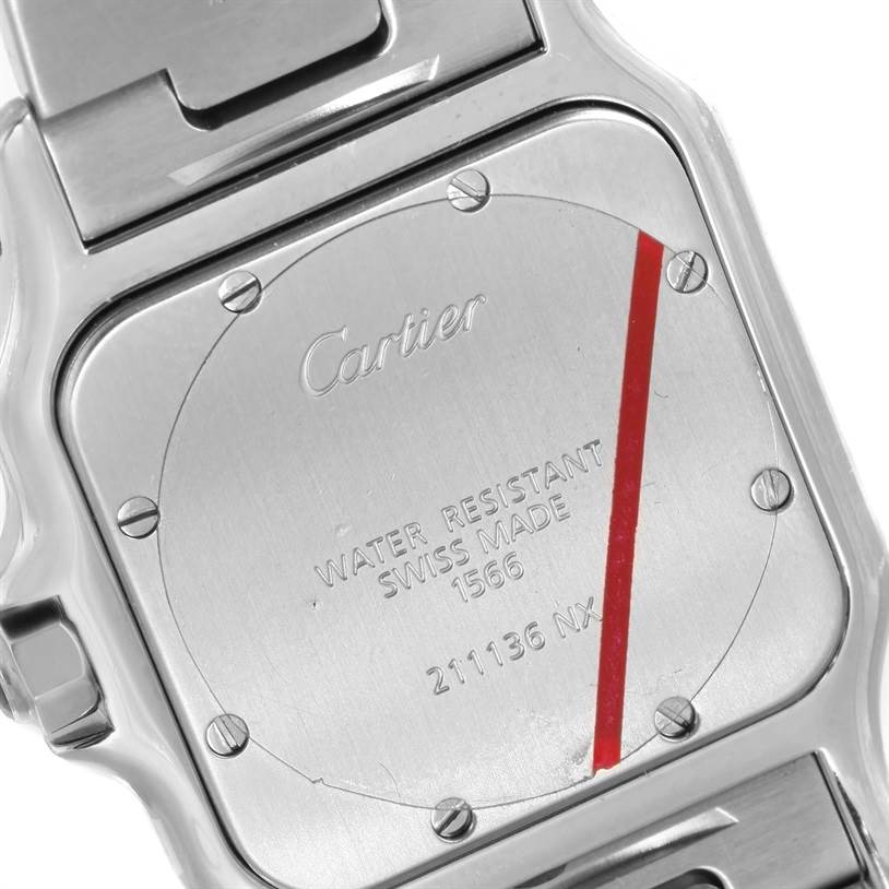 This is a close-up view of the back of a Cartier Santos W20011C4 Men
s Stainless Steel Silver Dial W20011C4 Men
s Stainless Steel Silver Dial watch, showing the case back and brand engravings.