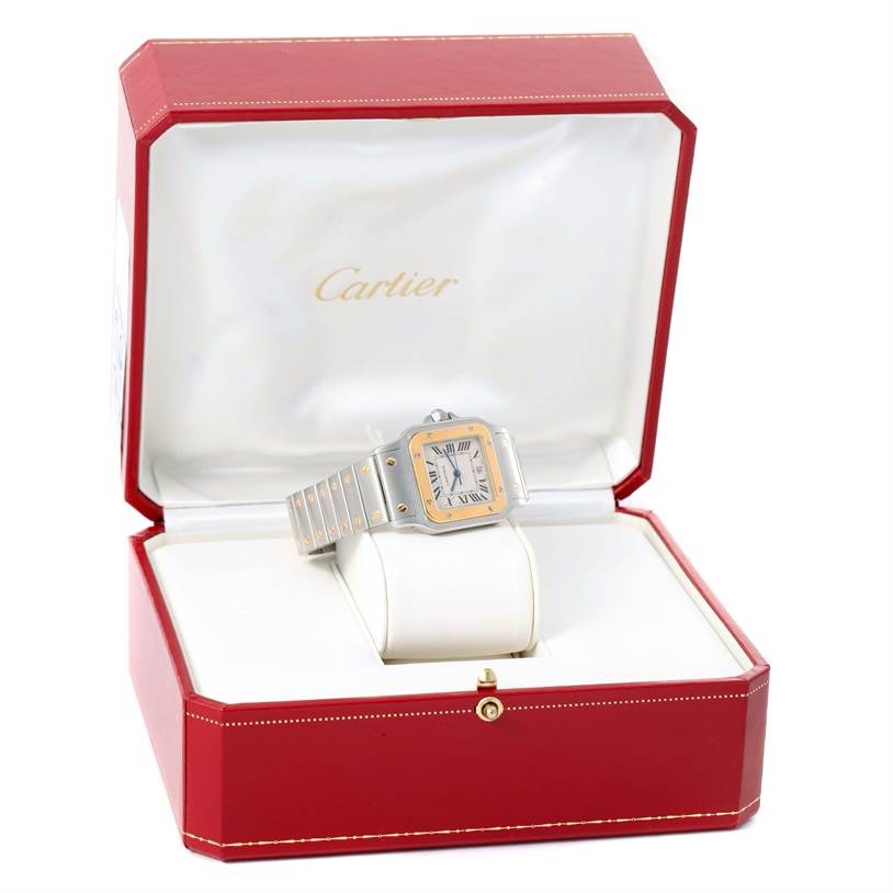 The Cartier Santos W20011C4 Men
s Stainless Steel Silver Dial W20011C4 Men
s Stainless Steel Silver Dial watch is displayed in an open red box, showcasing the face and part of the bracelet.