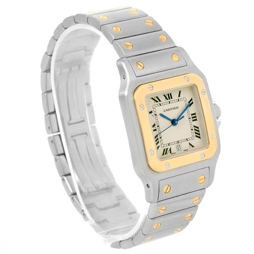 This image shows a side angle view of a Cartier Santos W20011C4 Stainless Steel Silver Dial W20011C4 Stainless Steel Silver Dial watch, highlighting its face, bezel, and metal bracelet.